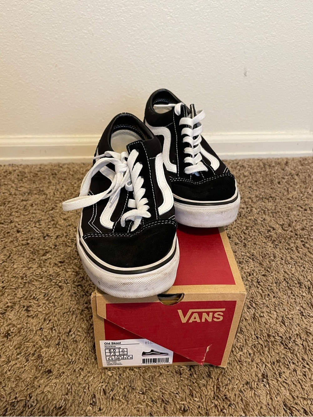 Black and White Vans sneakers